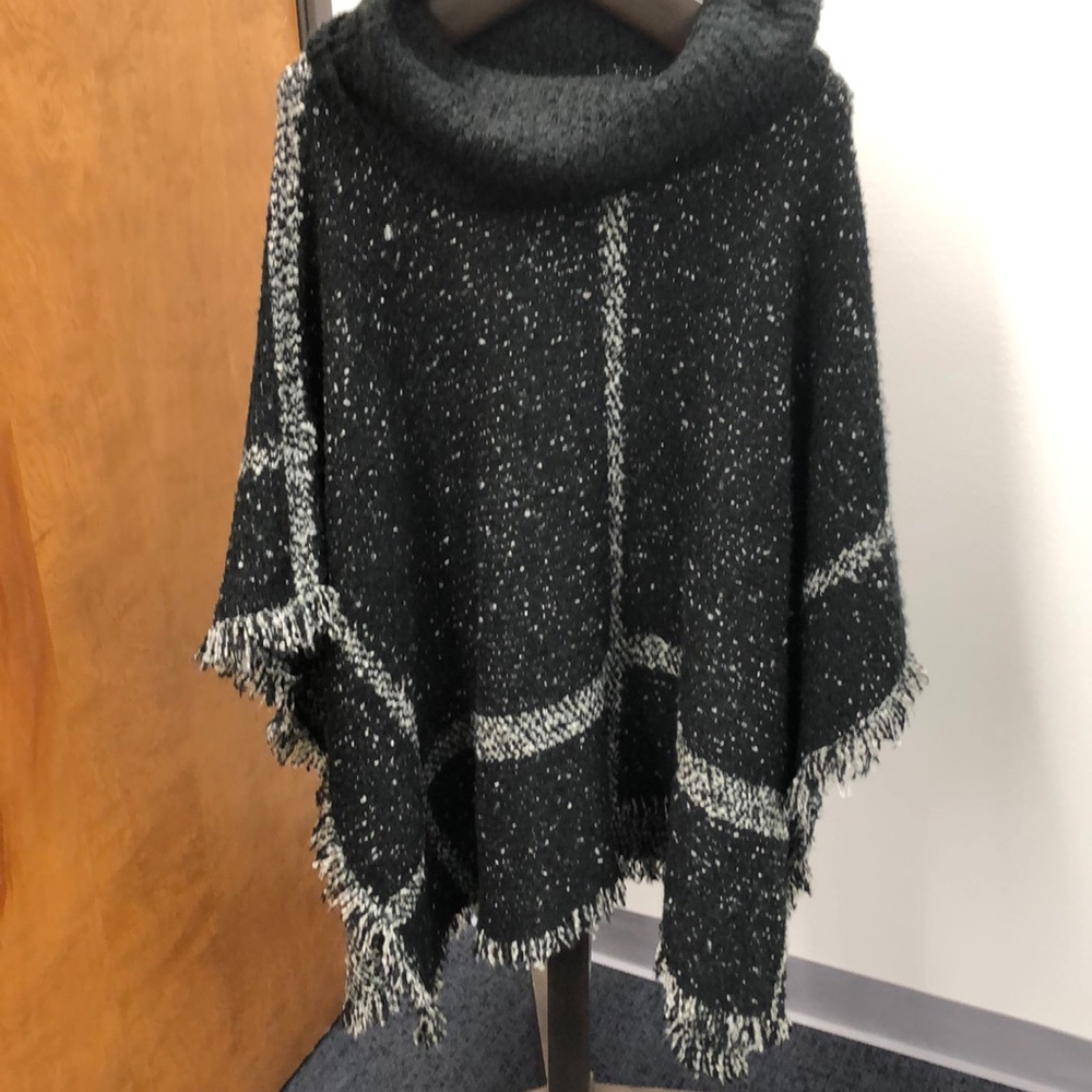 Nice puncho sweater.  Never worn.